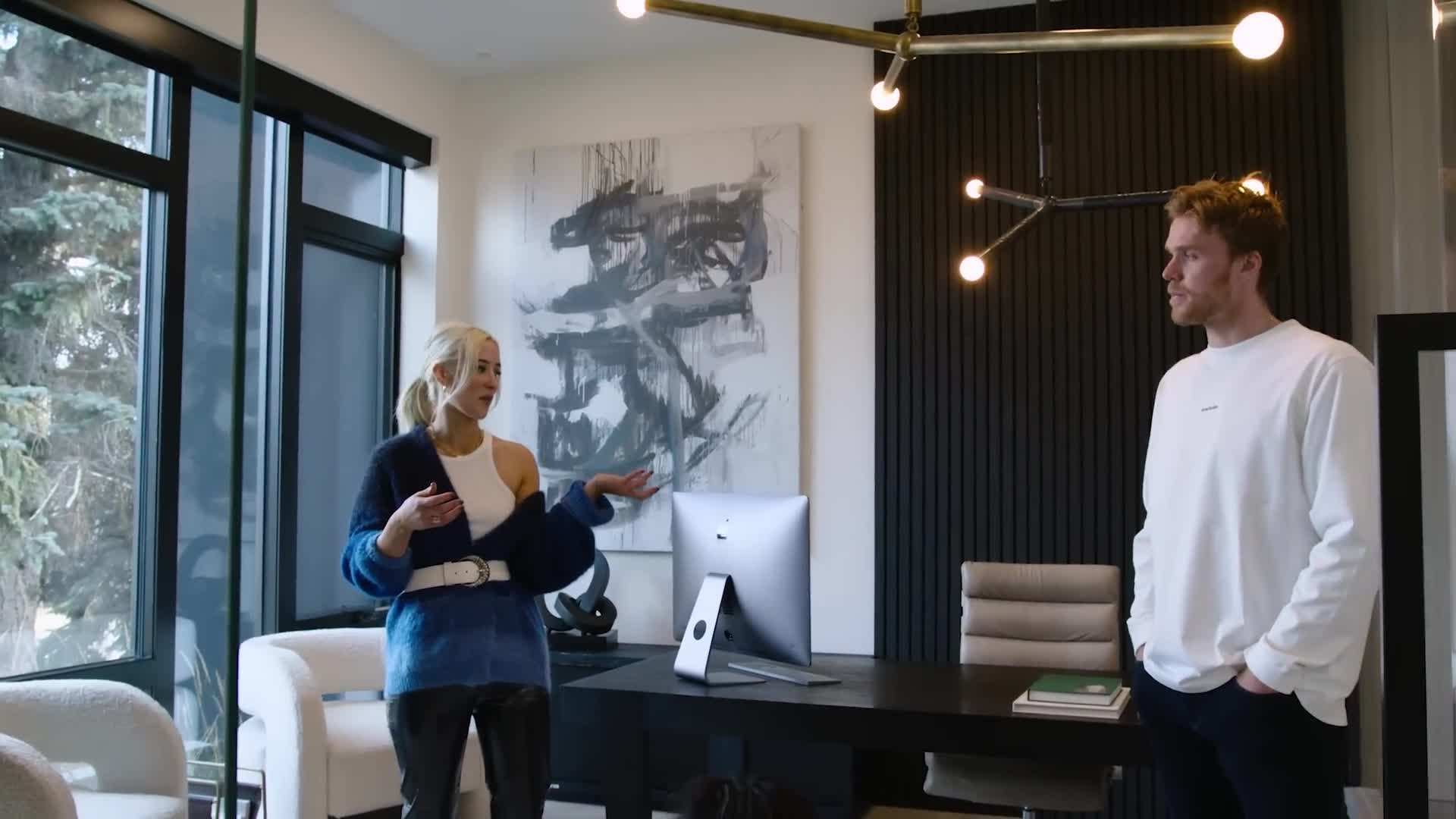 Connor McDavid's cozy living room with fireplace