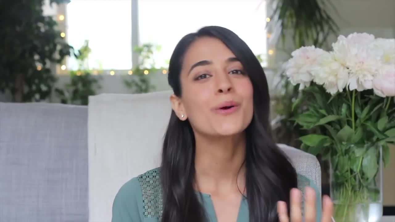 Challenging Negative Thoughts: A person writing negative thoughts on a piece of paper, crossed out