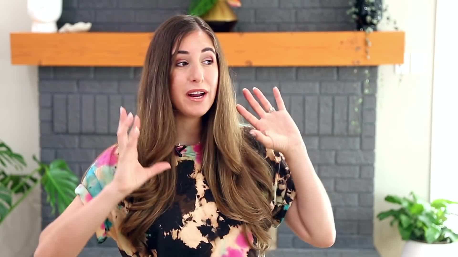 Spraying vinegar solution on a mirror