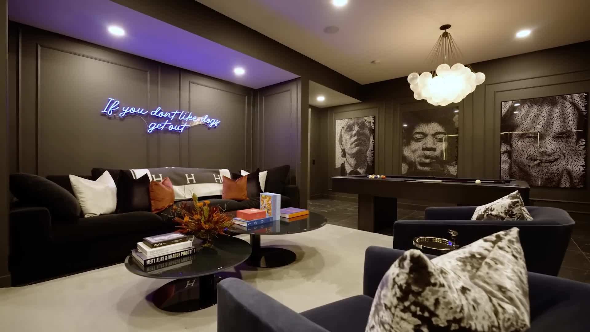 Comfortable bed with luxurious linens in McDavid's bedroom