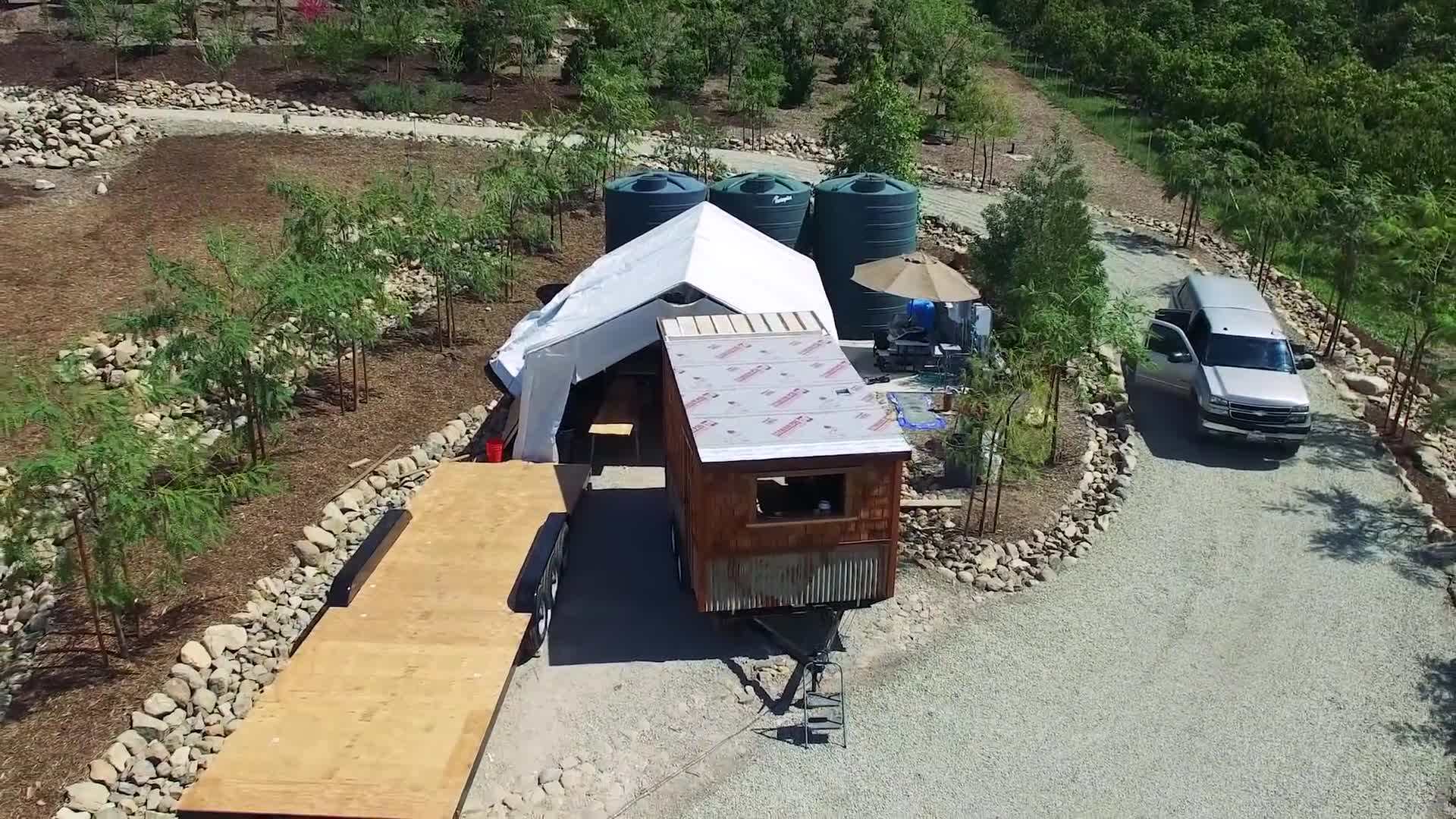 Ryan working inside the solar-powered mobile workshop