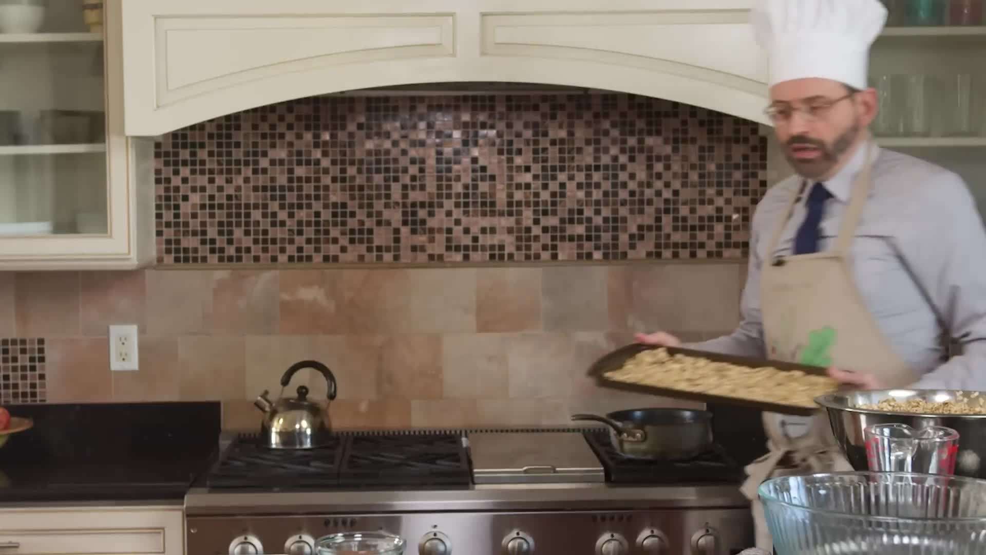 Baking groatnola in the oven until golden and crispy