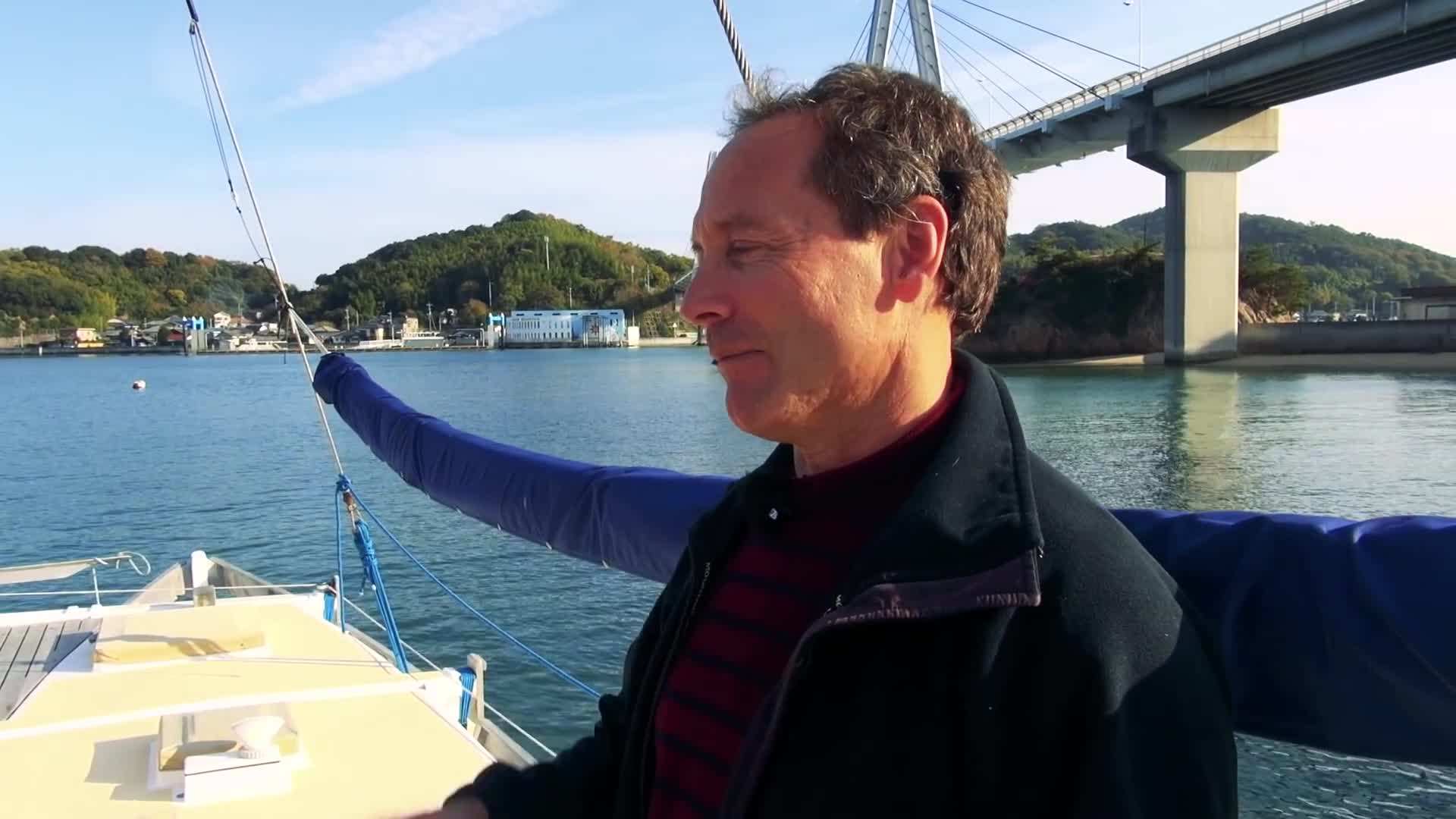 Family enjoying sunset view from their sailboat