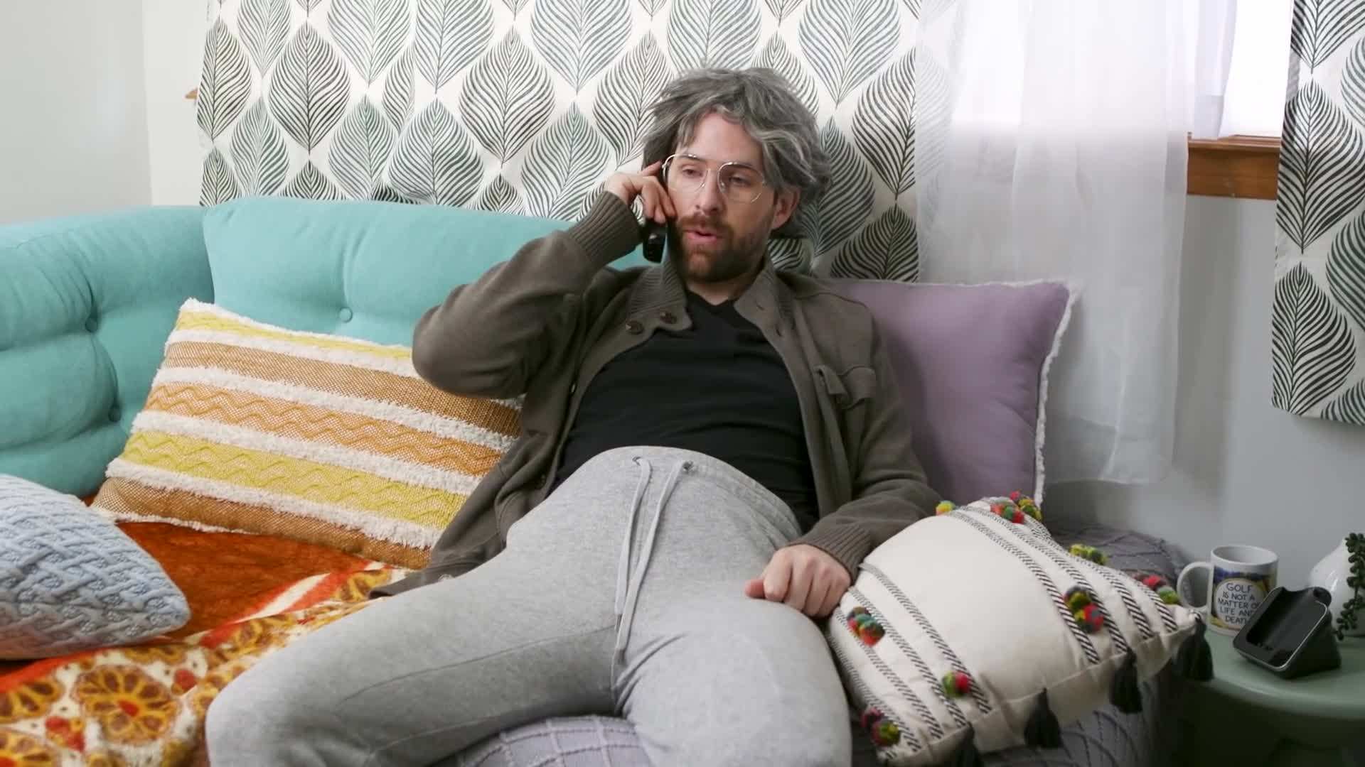 A couple sitting on a bench, talking and laughing without any distractions from their phones