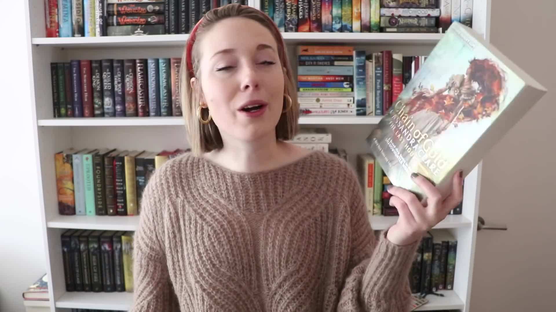 A reader deep in thought while reading a challenging book