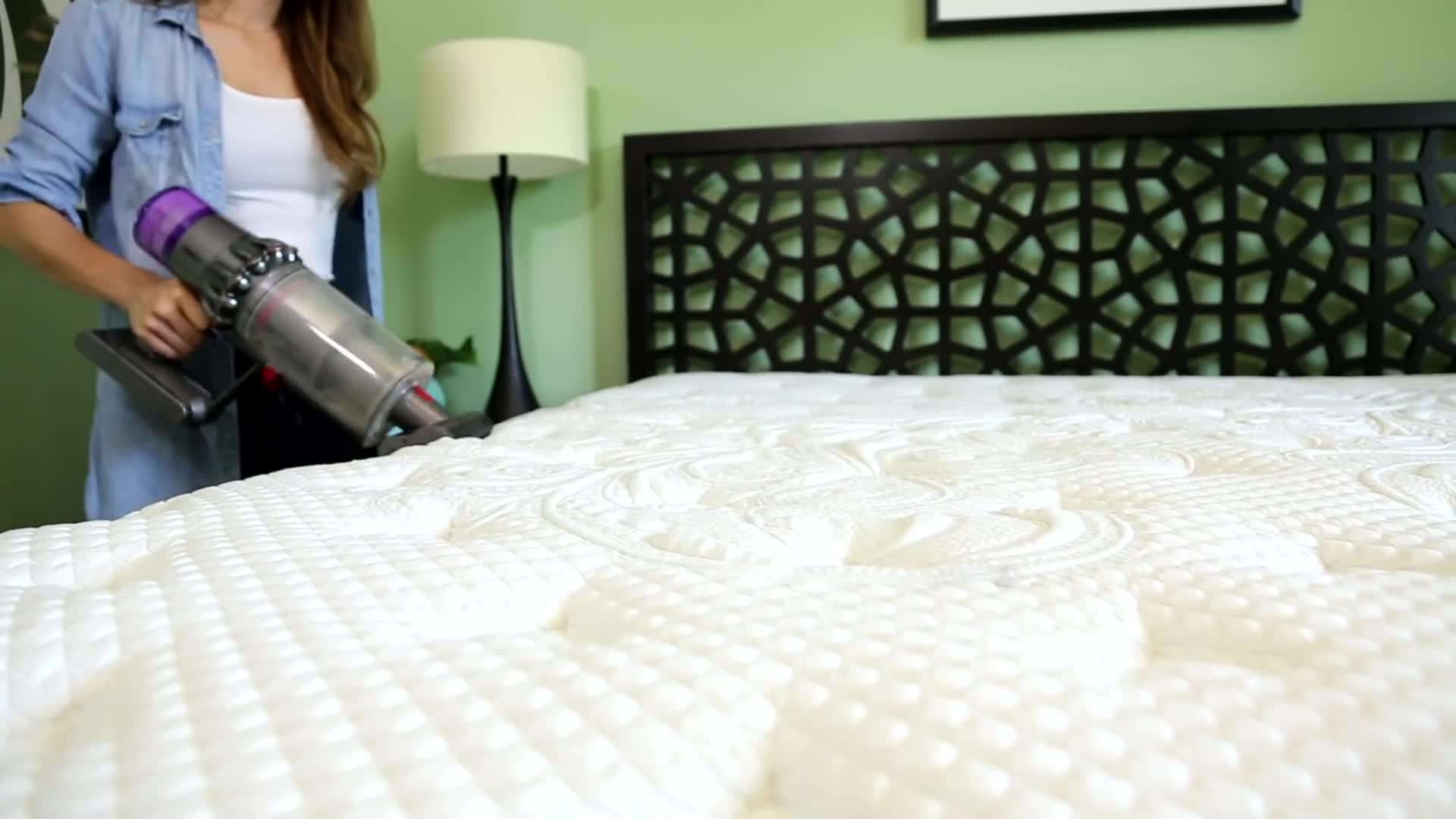 Sprinkling baking soda over the mattress to absorb odors