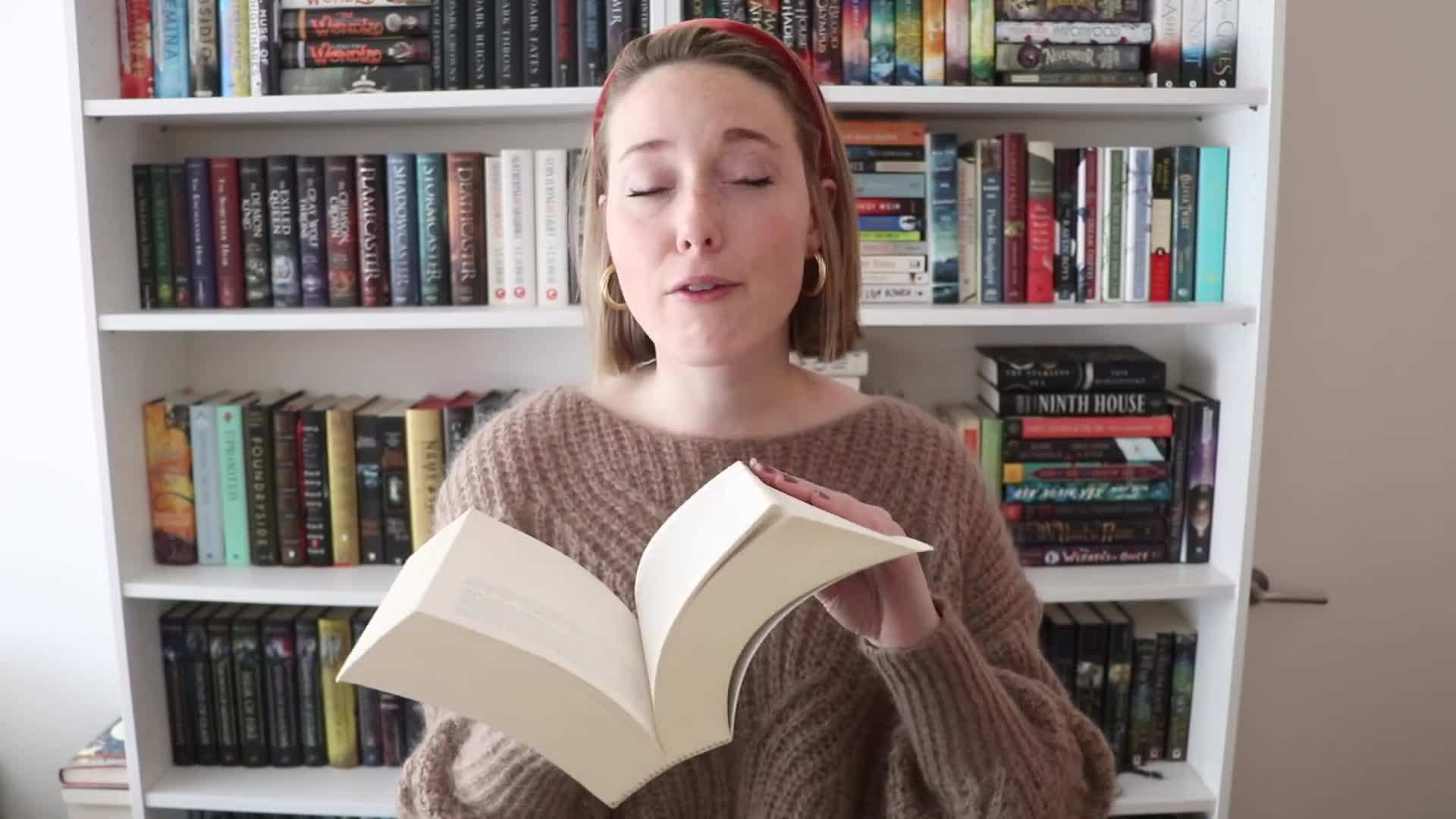 A stack of books with 'intimidating' written on their spines