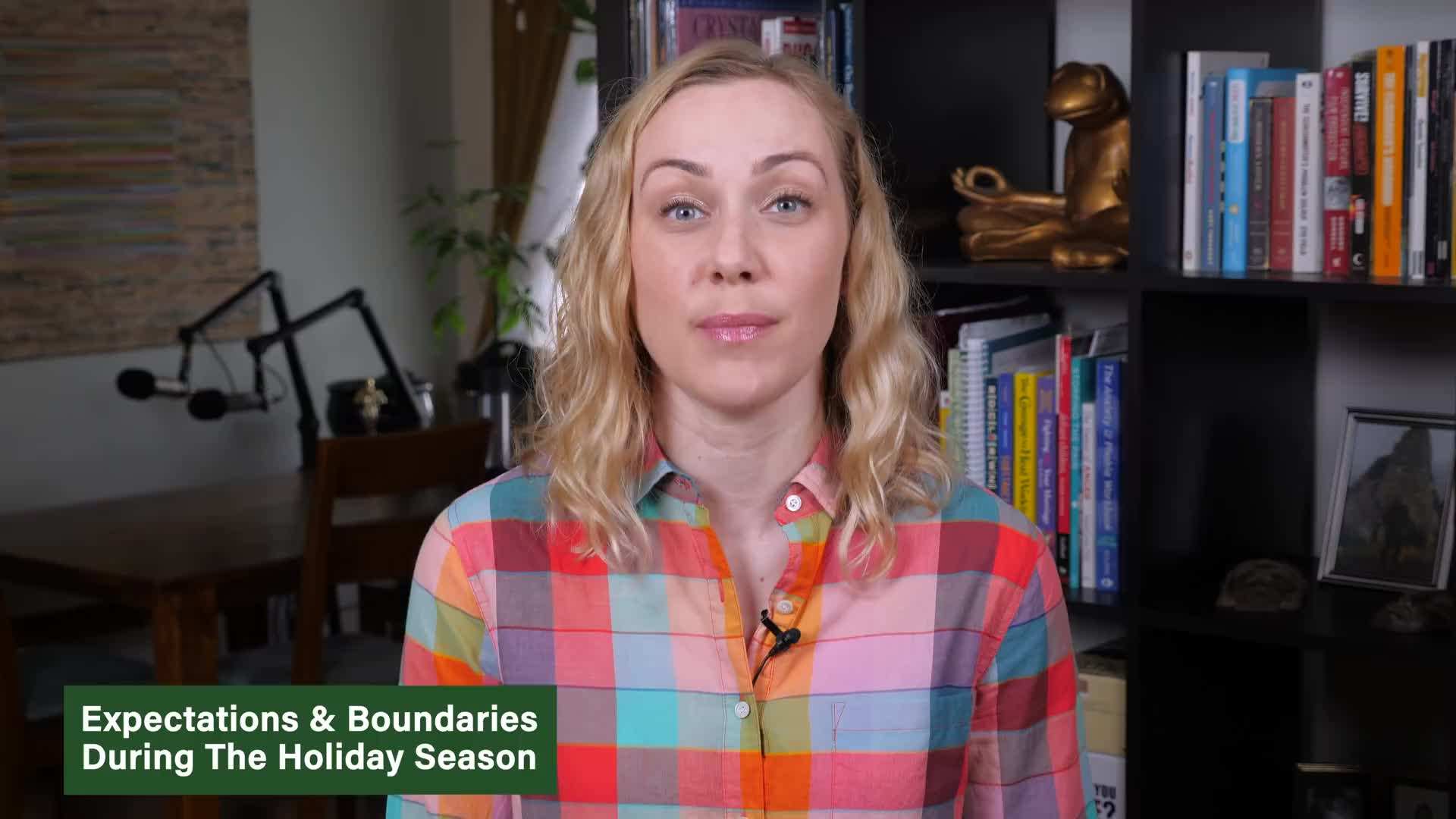Family gathering around a beautifully decorated Christmas tree