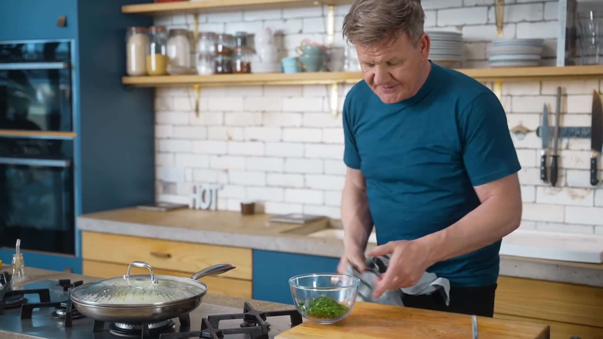 Cauliflower steaks sizzling on a hot pan