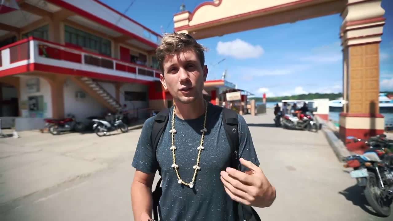 Turquoise waters and powdery white sands at Ticao Island's beaches