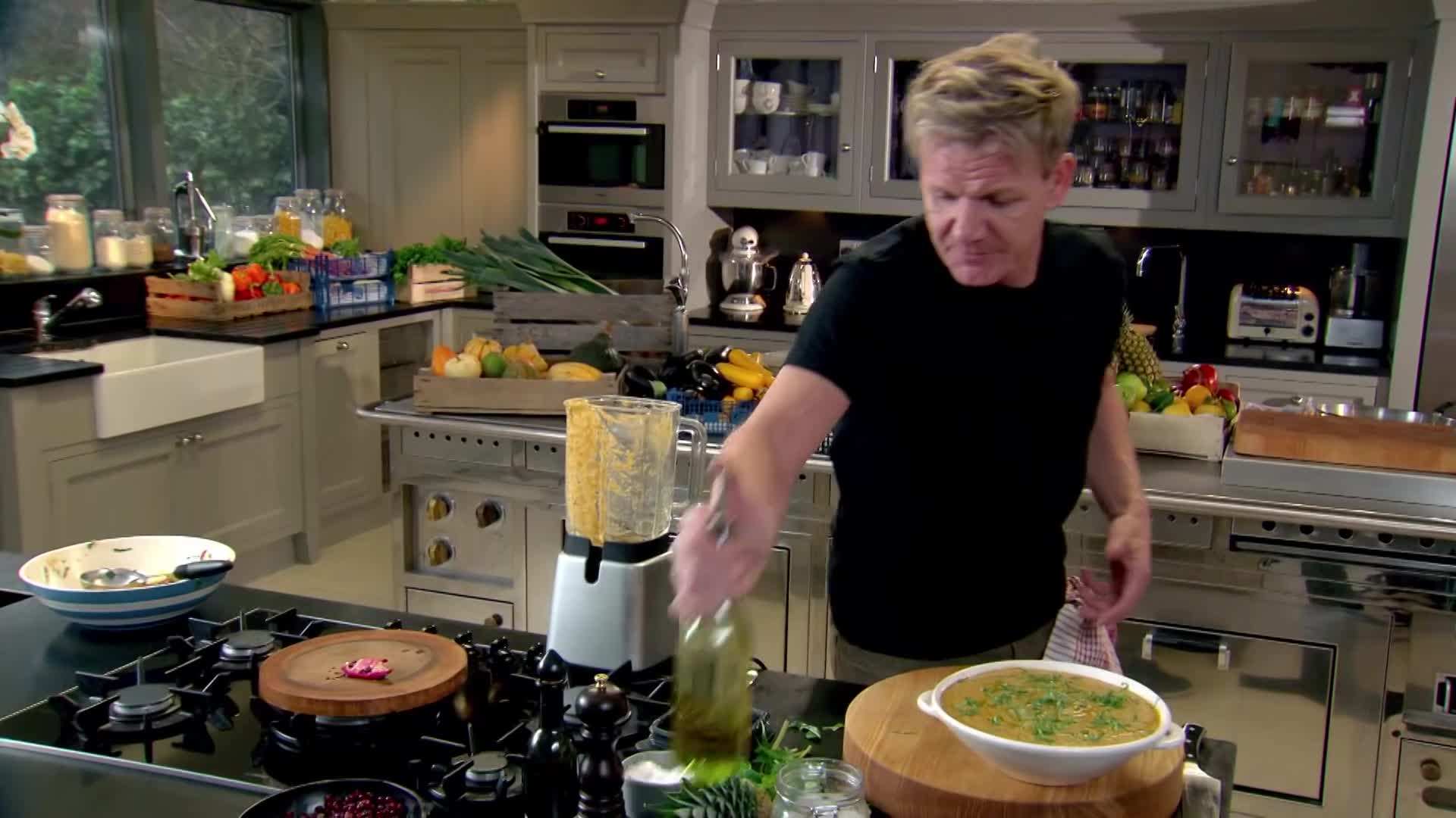 Gordon Ramsay presenting the vegan curry in a beautiful serving dish