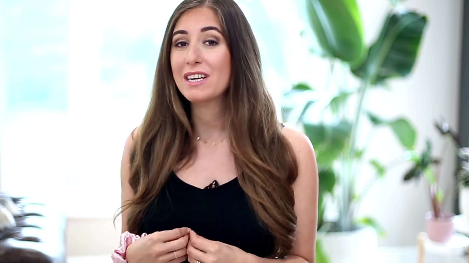Image of a person vacuuming the floor