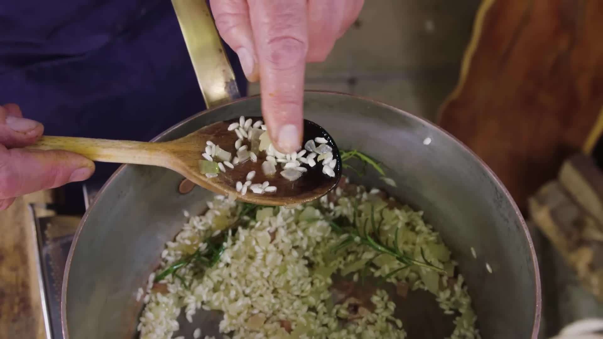 Adding the vegetable broth gradually