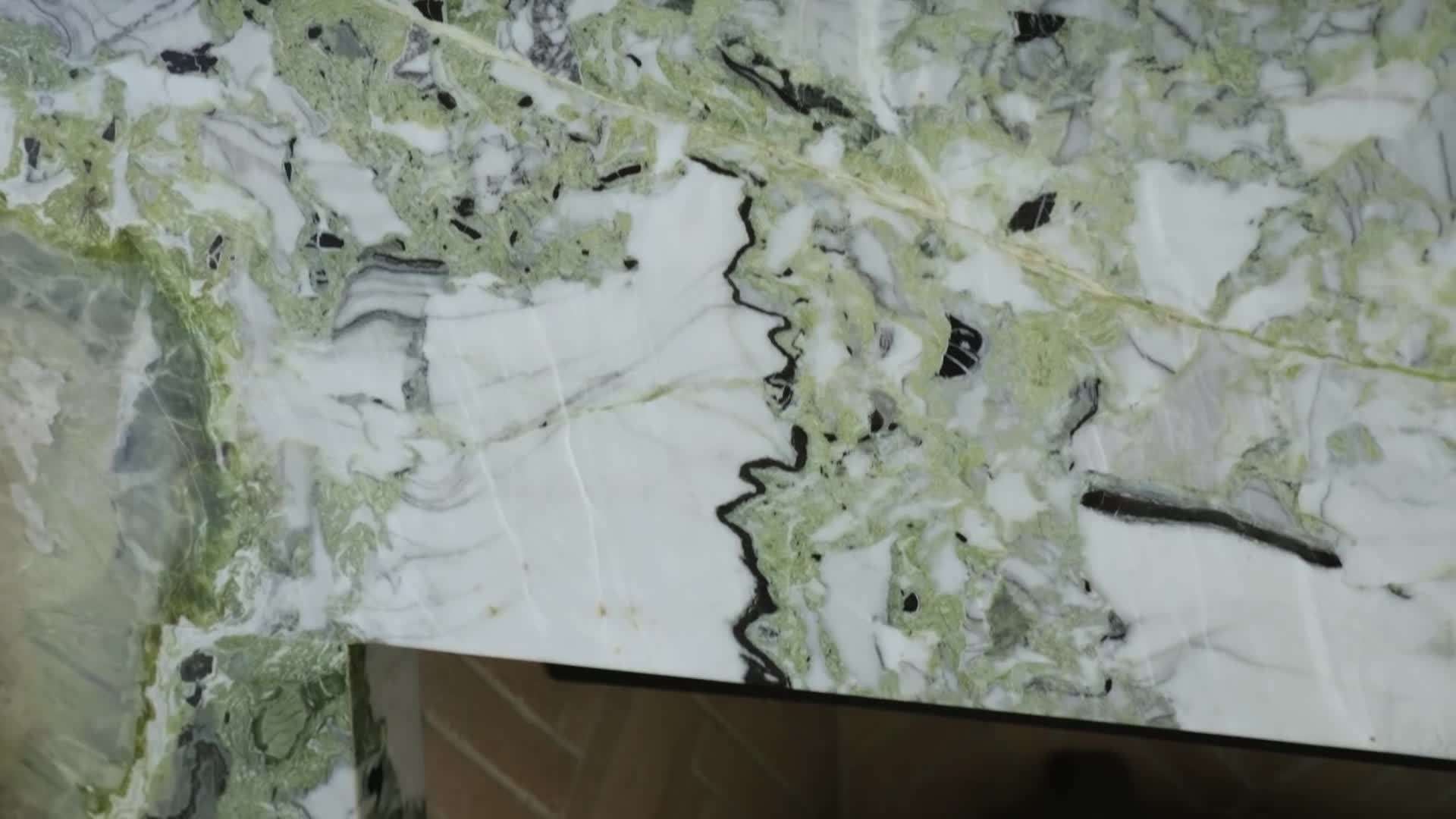 Outdoor terrace with an infinity pool and mountain views