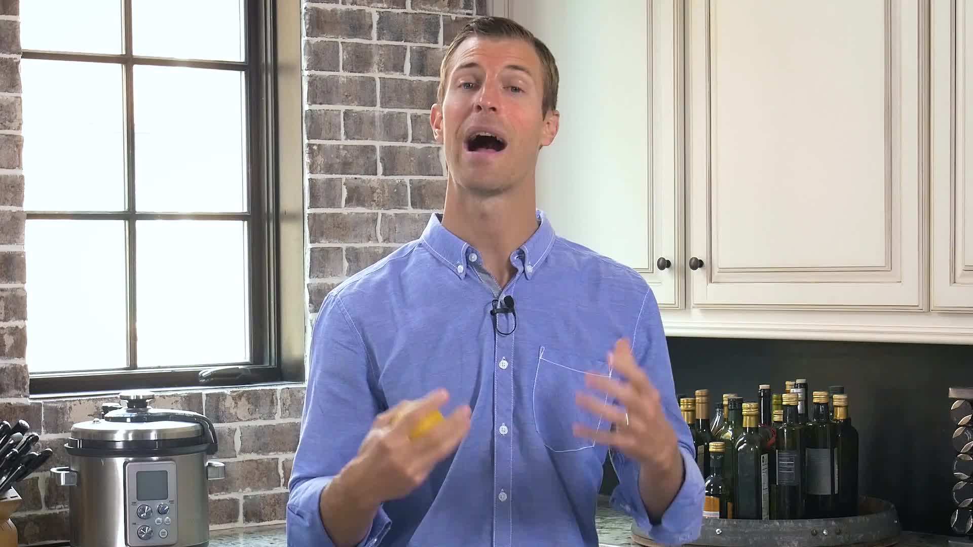 Glass of warm lemon water with lemon slices