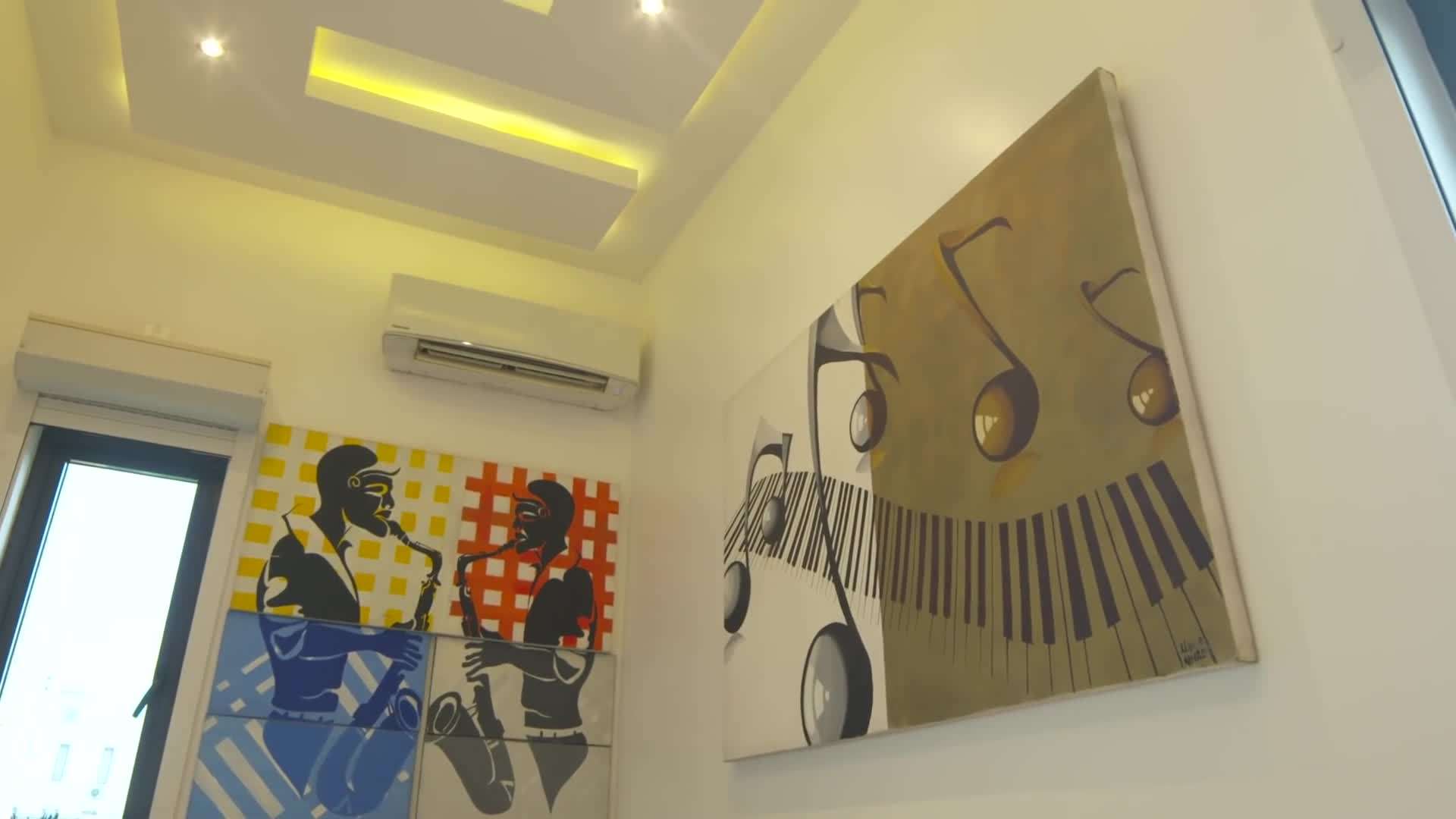 The grand foyer with high ceilings and a stunning chandelier
