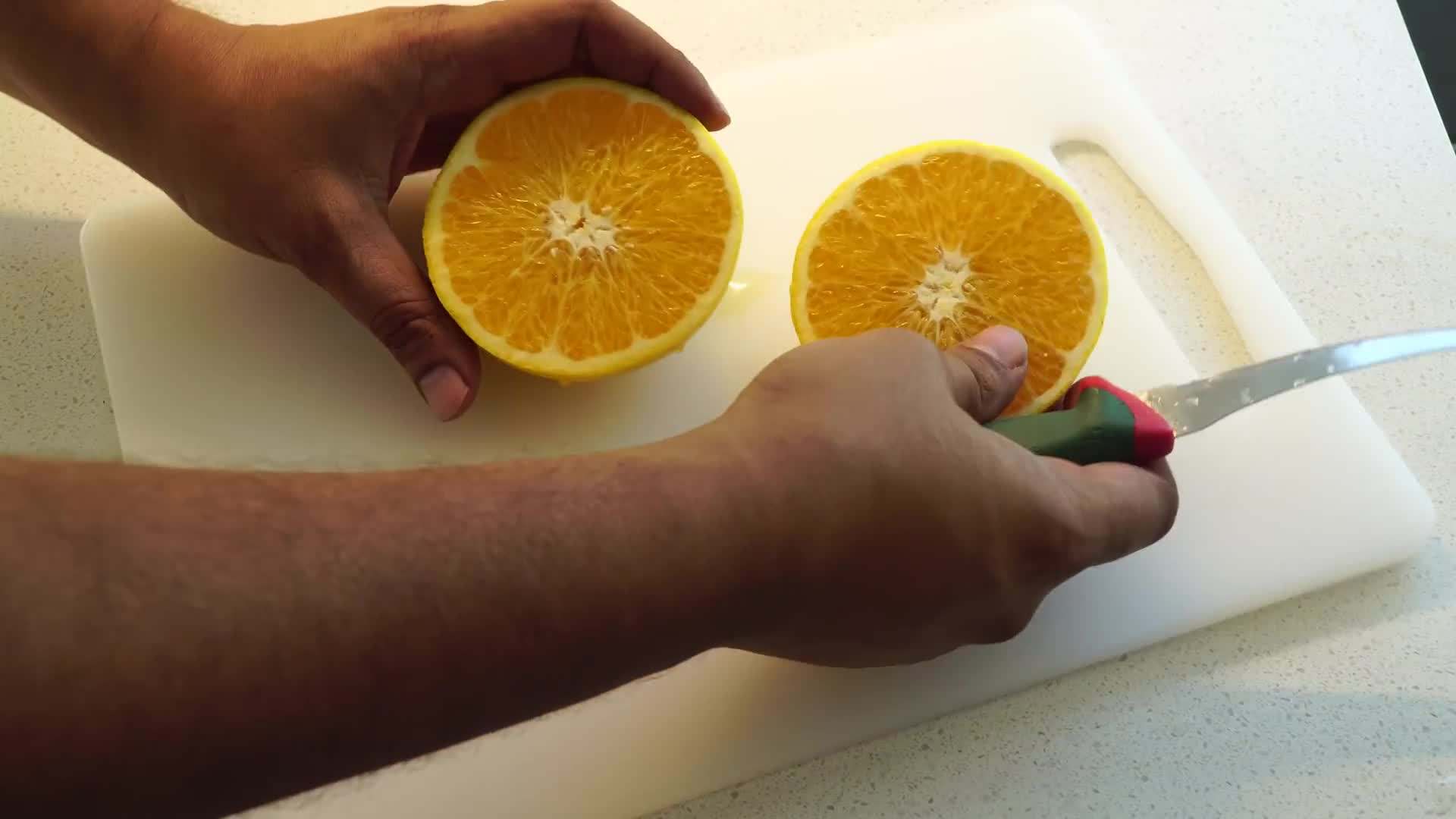 Proper Technique for Harvesting Oranges from the Tree