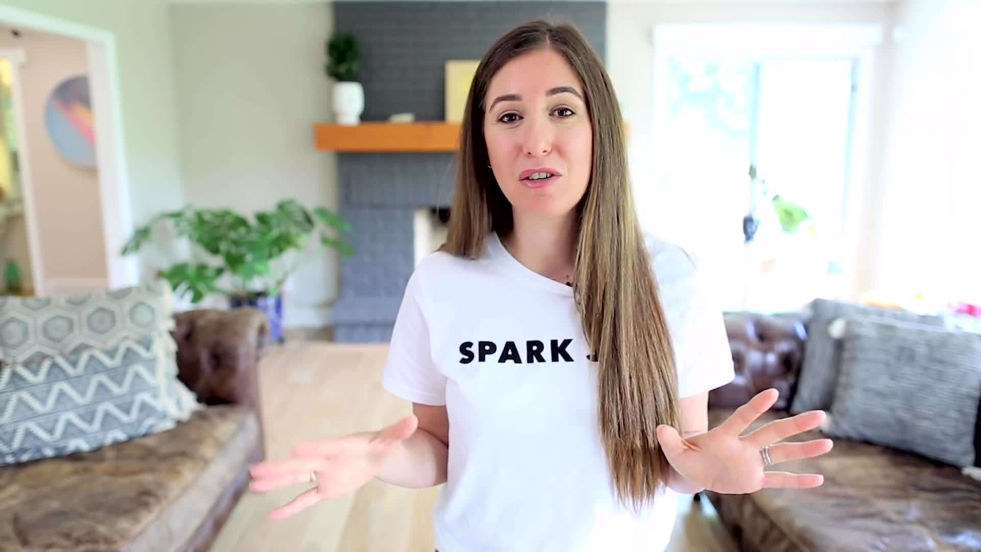 Using a brush to scrub away stains and residue in the toilet