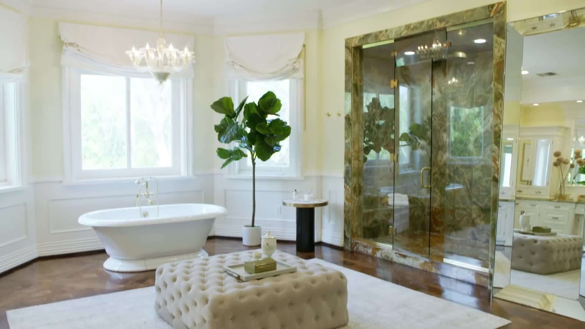 The grand entrance with the two-story chandelier