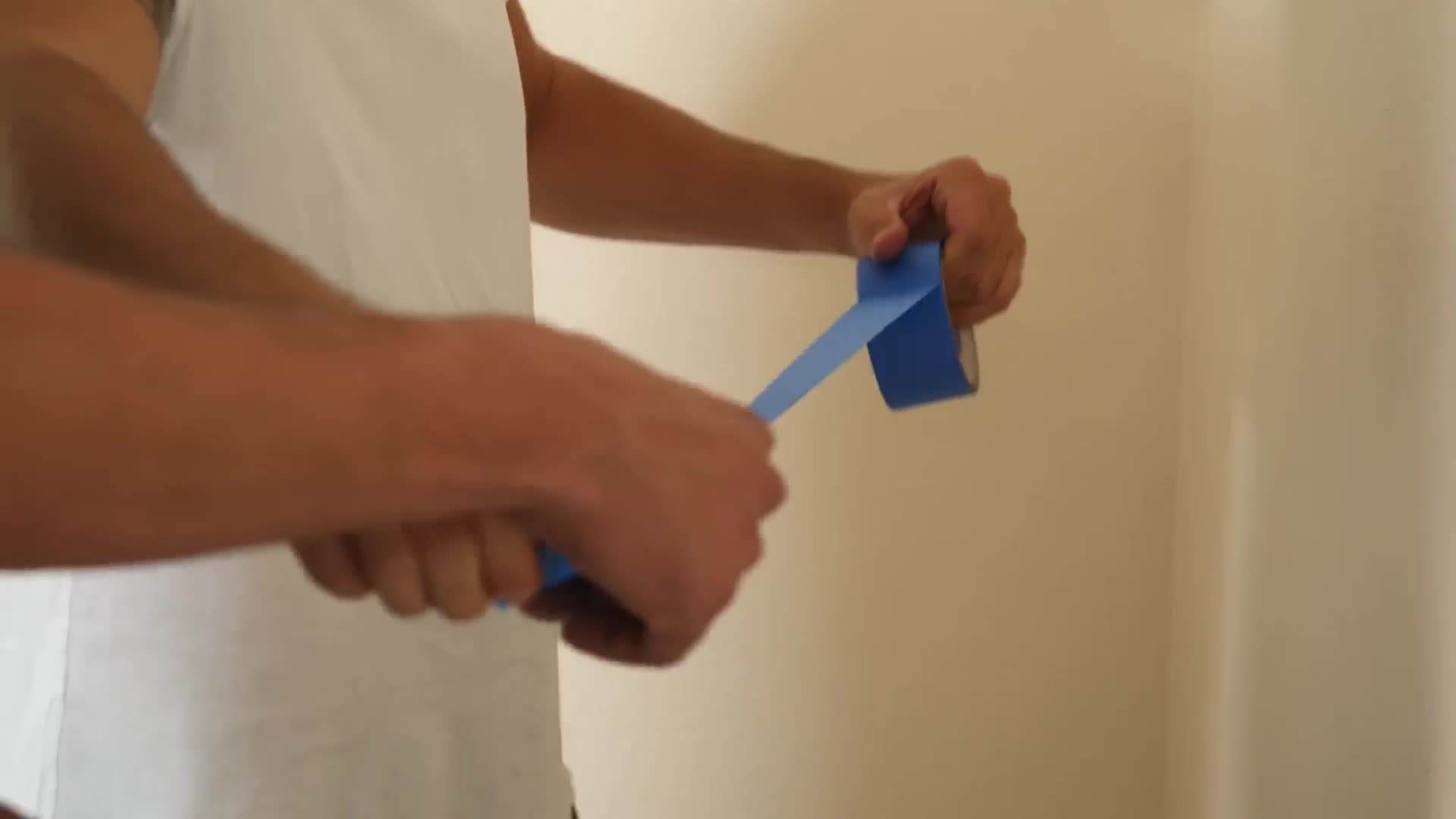 Different shades of pale blue paint cans