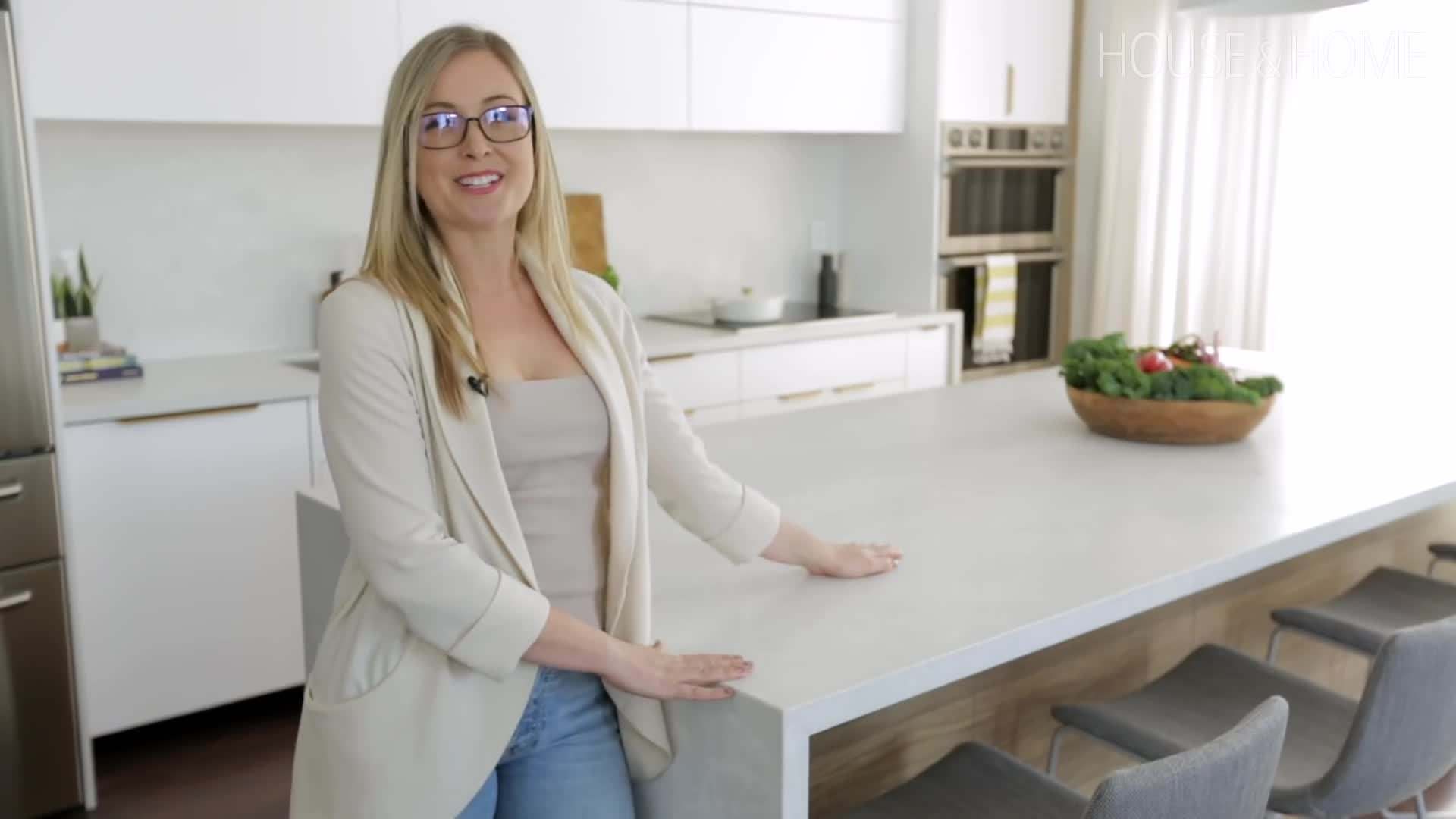 Full view of the kitchen with the waterfall island