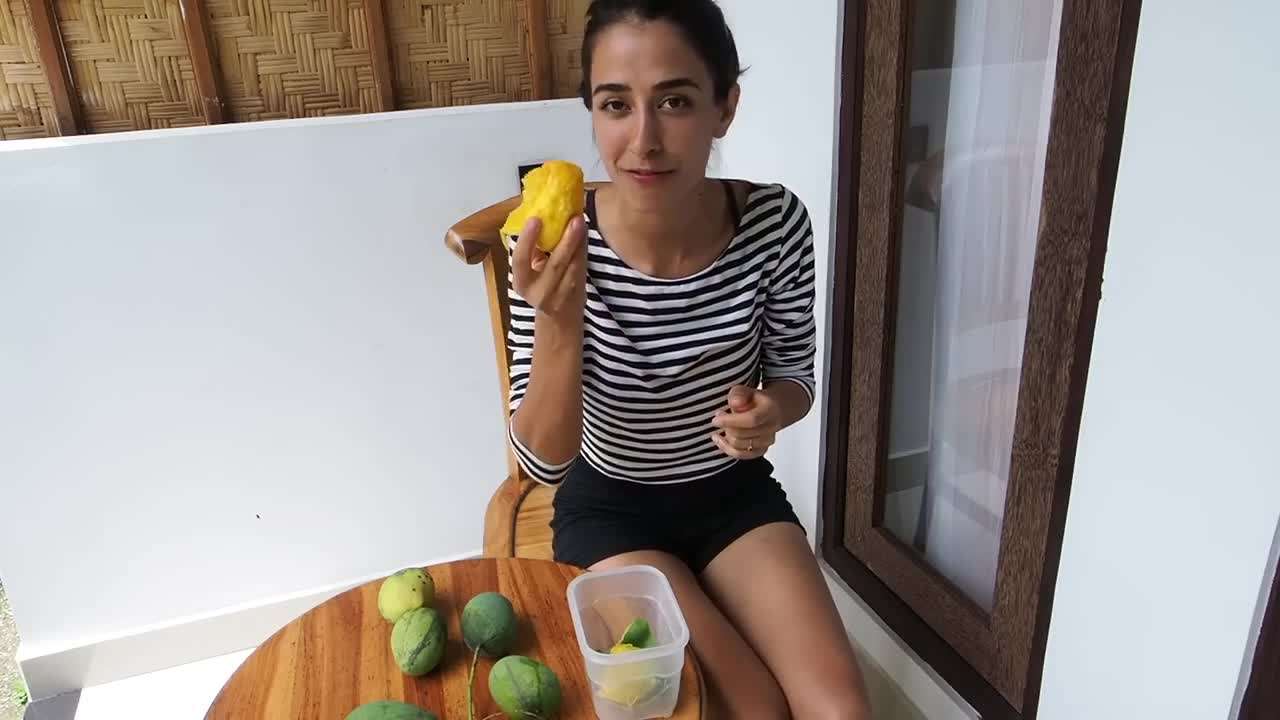 Enjoying a juicy mango