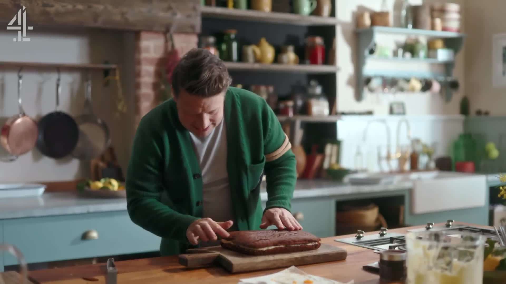 Cutting the chocolate sponge in half