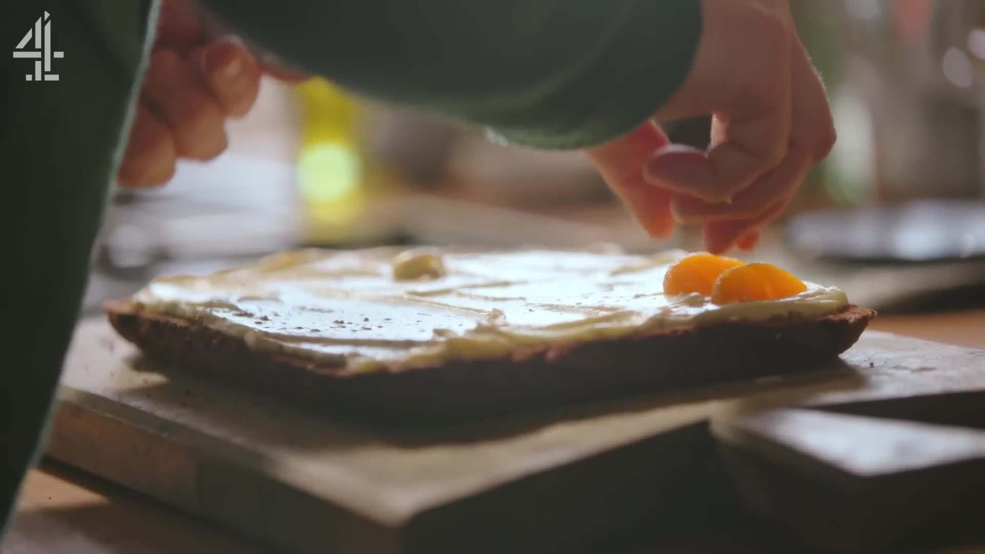 Adding Mandarin segments and juice to the buttercream