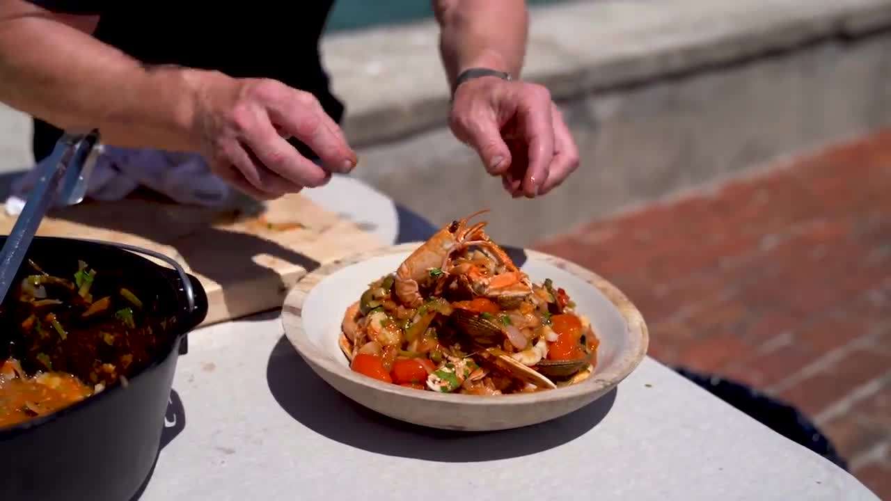 Garnishing the Seafood Stew