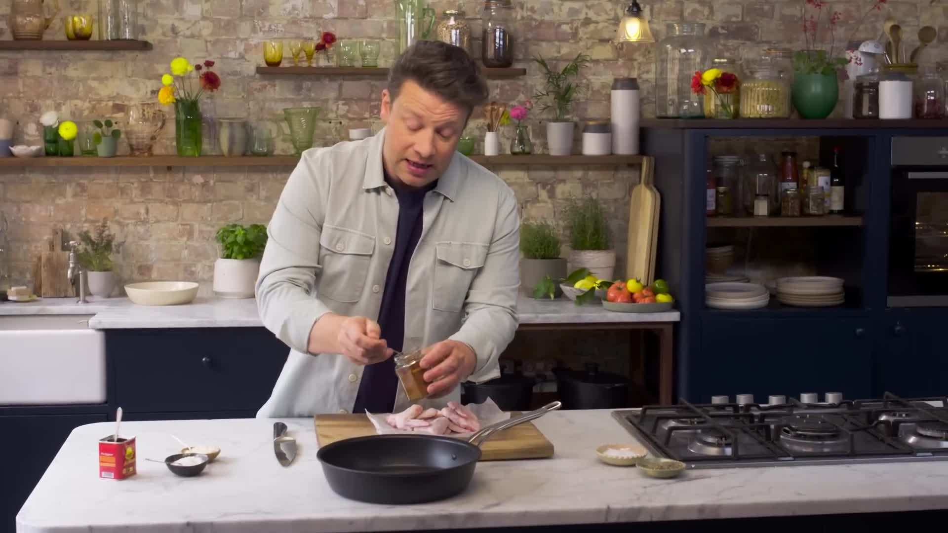 Cayenne pepper being added to the rub