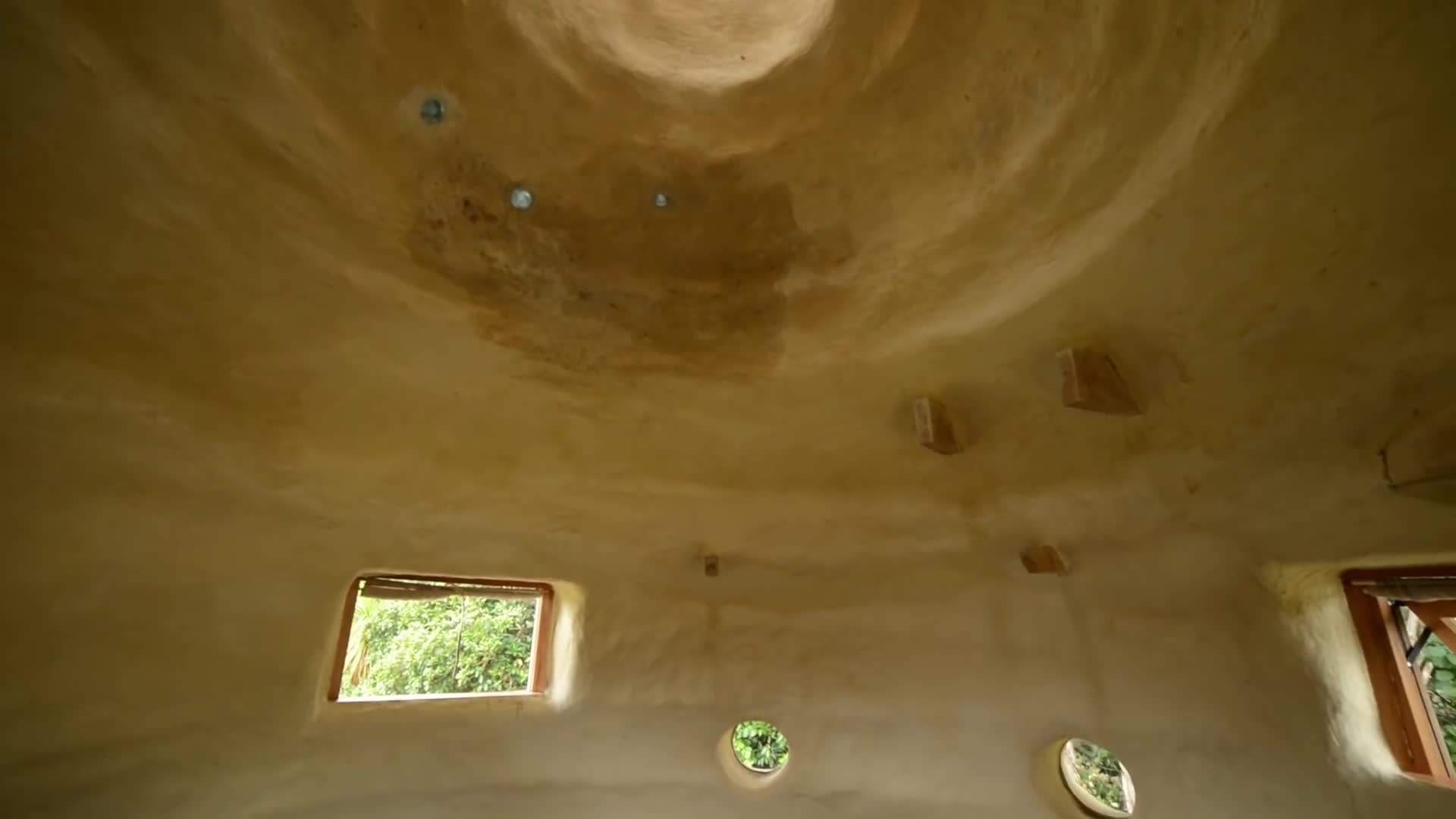 Earth House Domes Amidst Natural Landscape