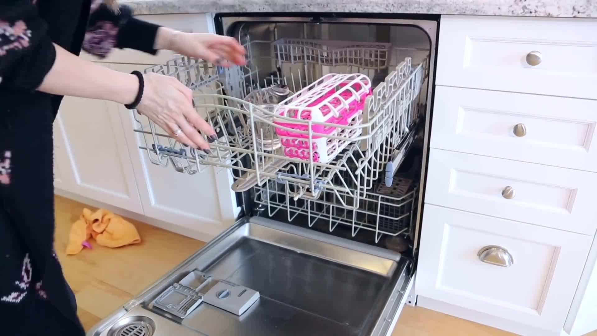 Placing vinegar on the top rack for the sanitize cycle