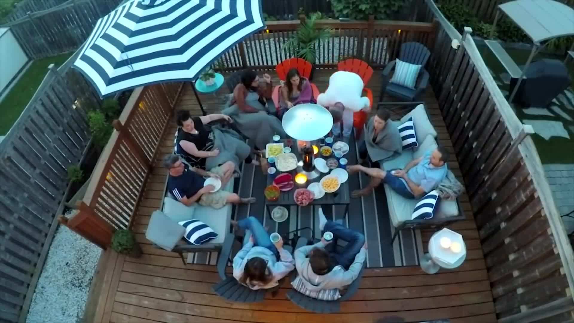 Using a high-pressure hose to clean outdoor bins