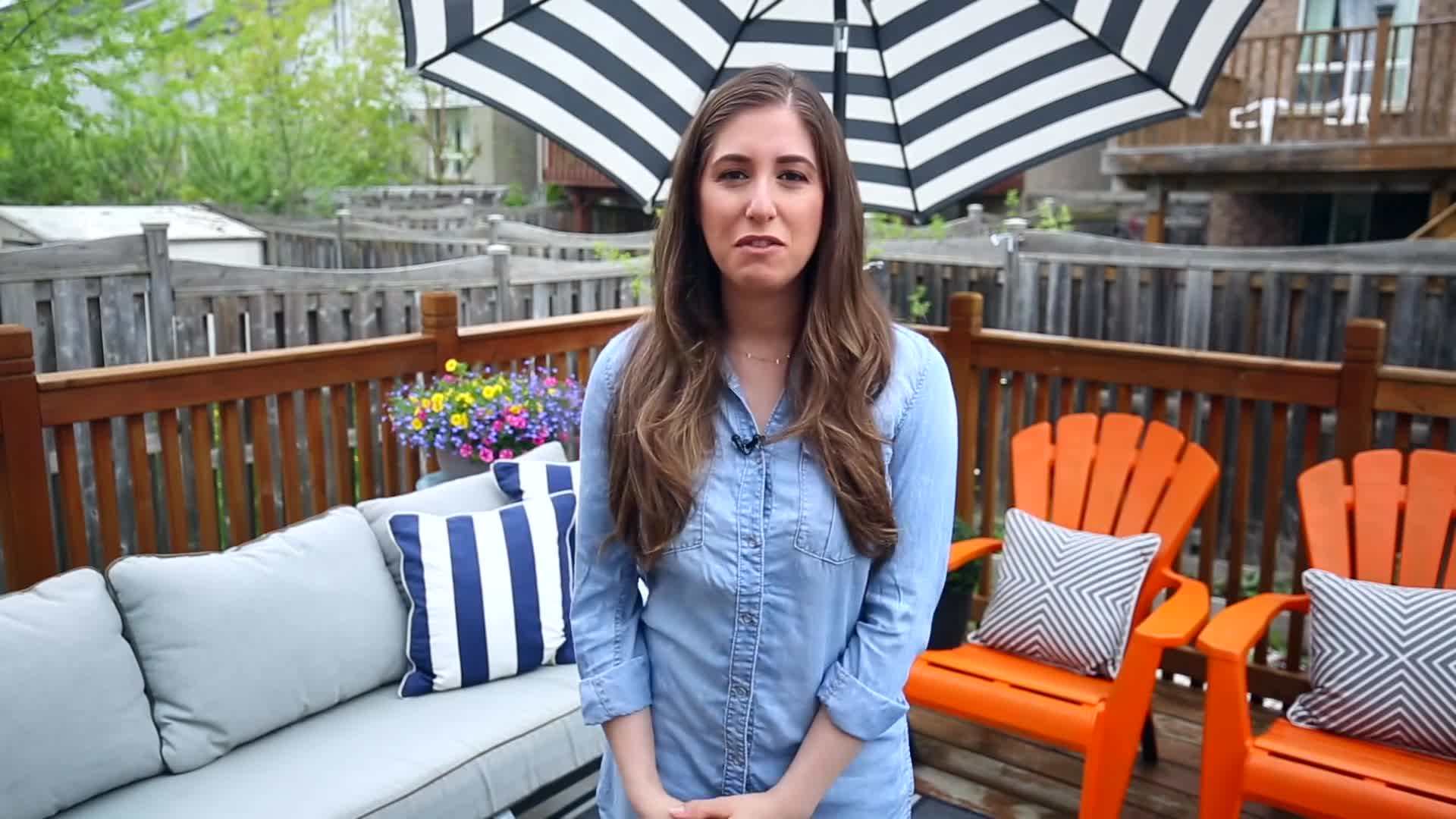 Cleaning outdoor patio furniture with a high-pressure hose