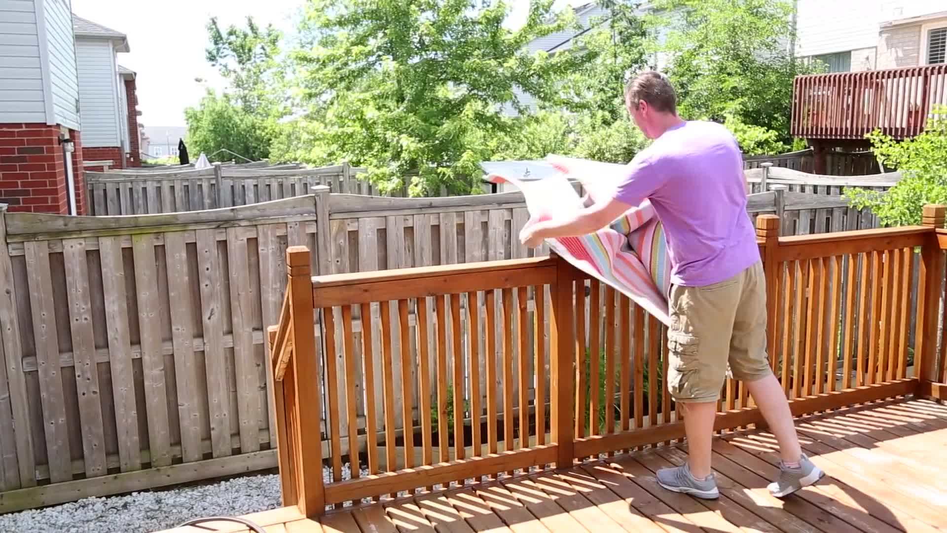 Beating Rugs and Pillows to Remove Dust