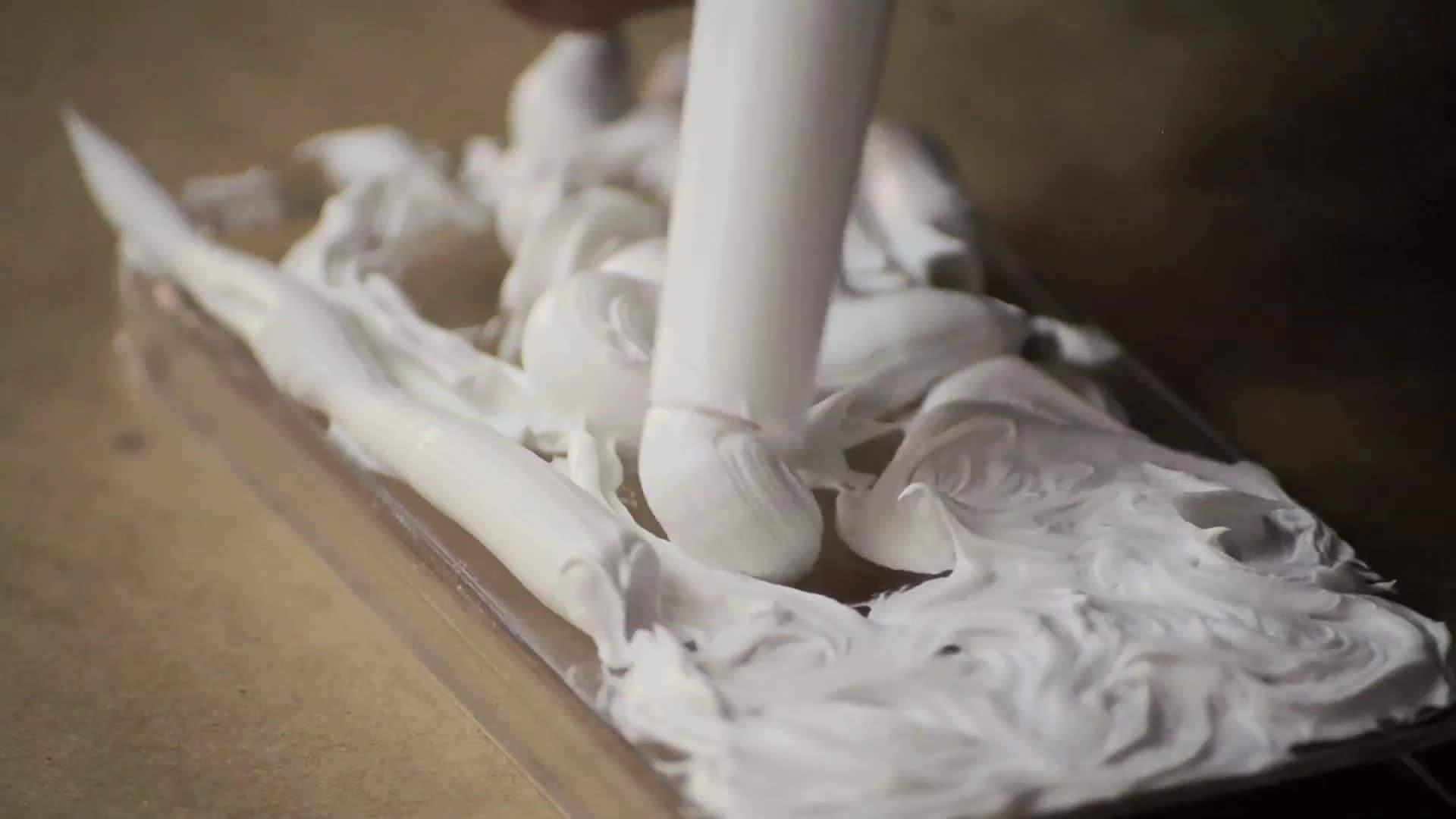 Applying the frosting base to the phone case