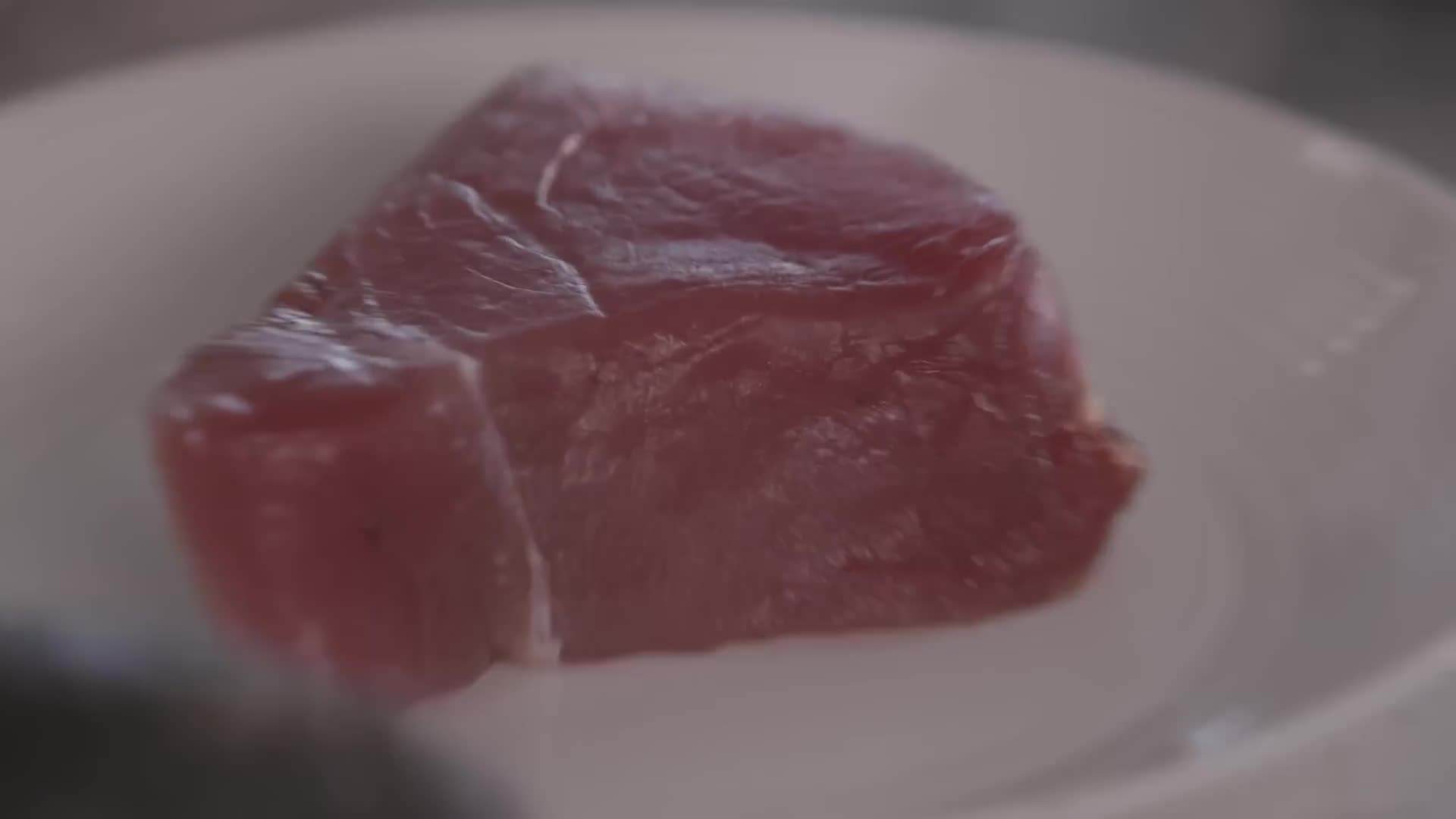Slicing the sushi-grade ahi tuna