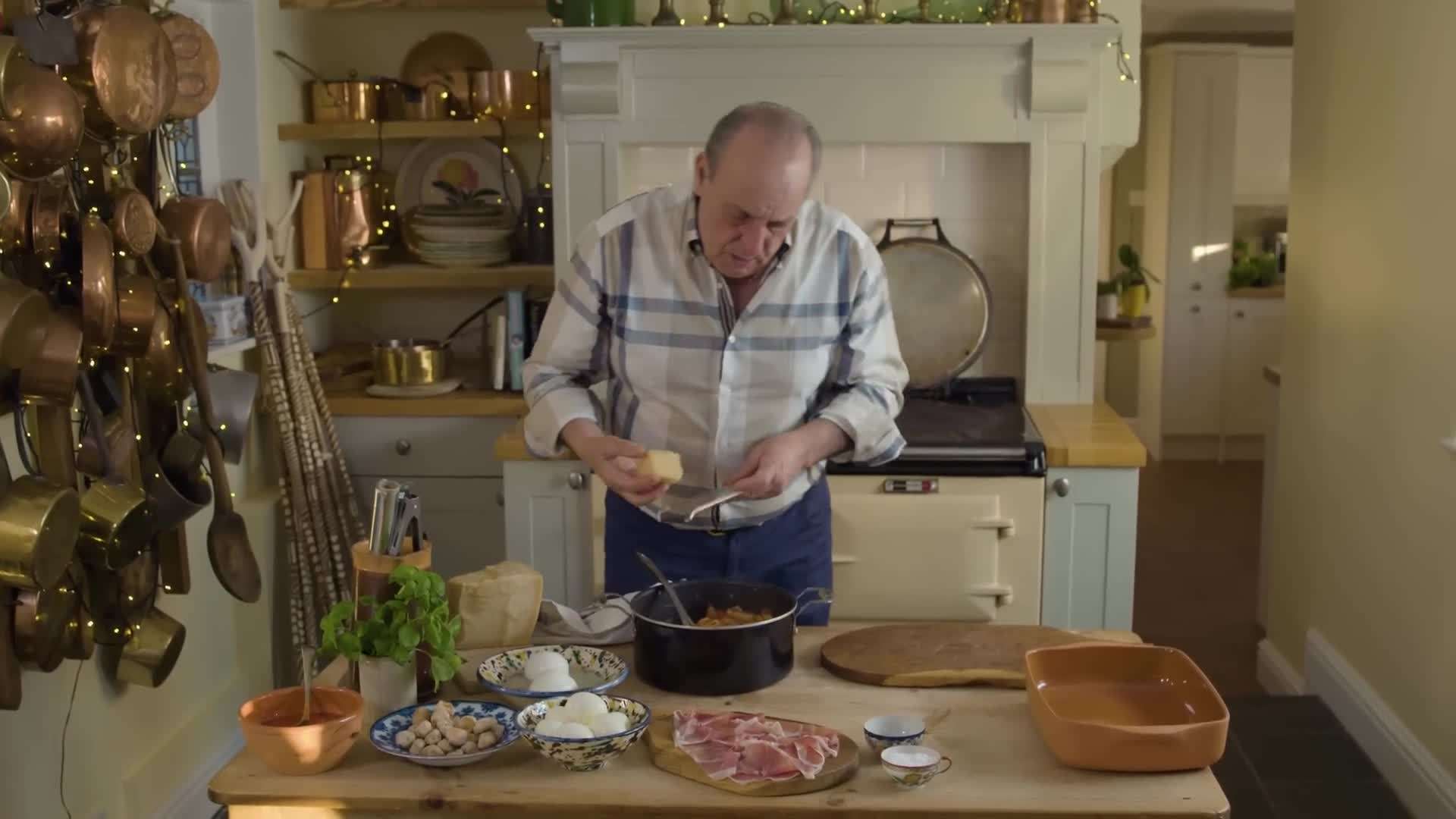 Layering the Pasta with Tomato Sauce and Ingredients