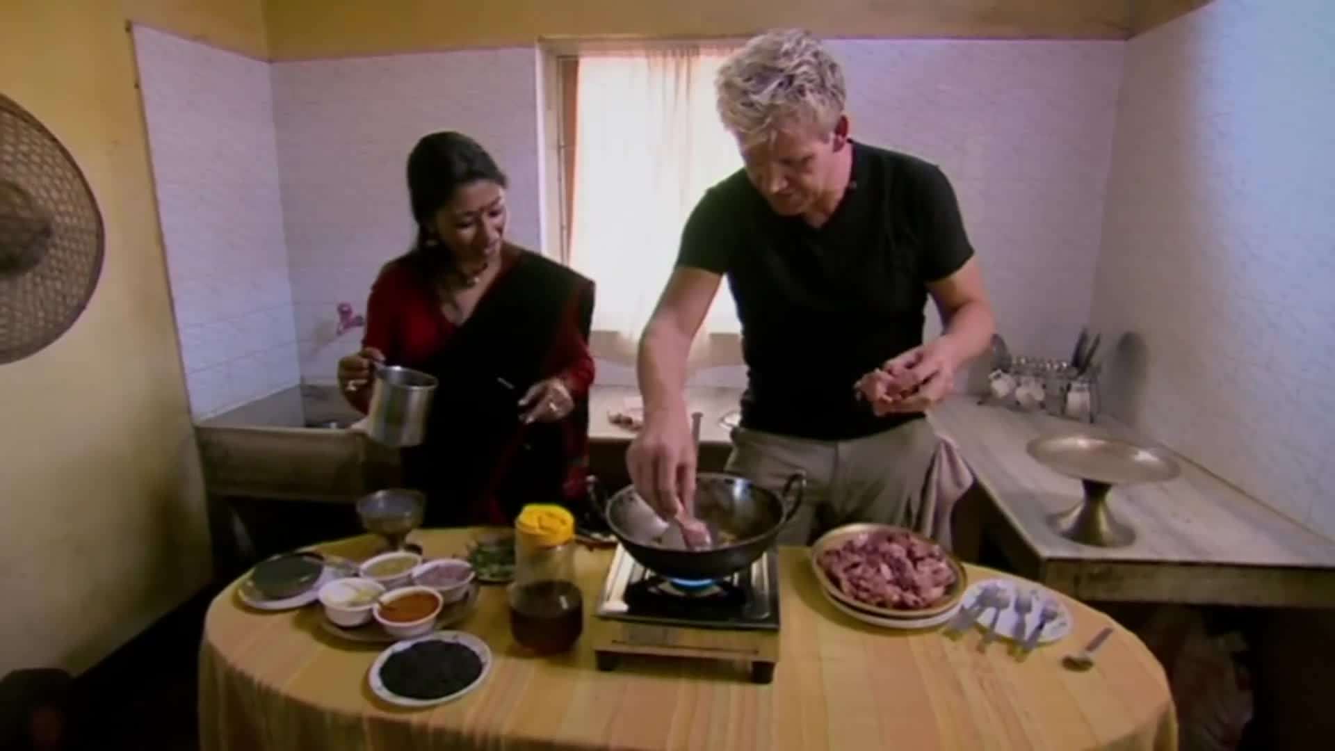 Gordon Ramsay preparing chicken with sesame seeds