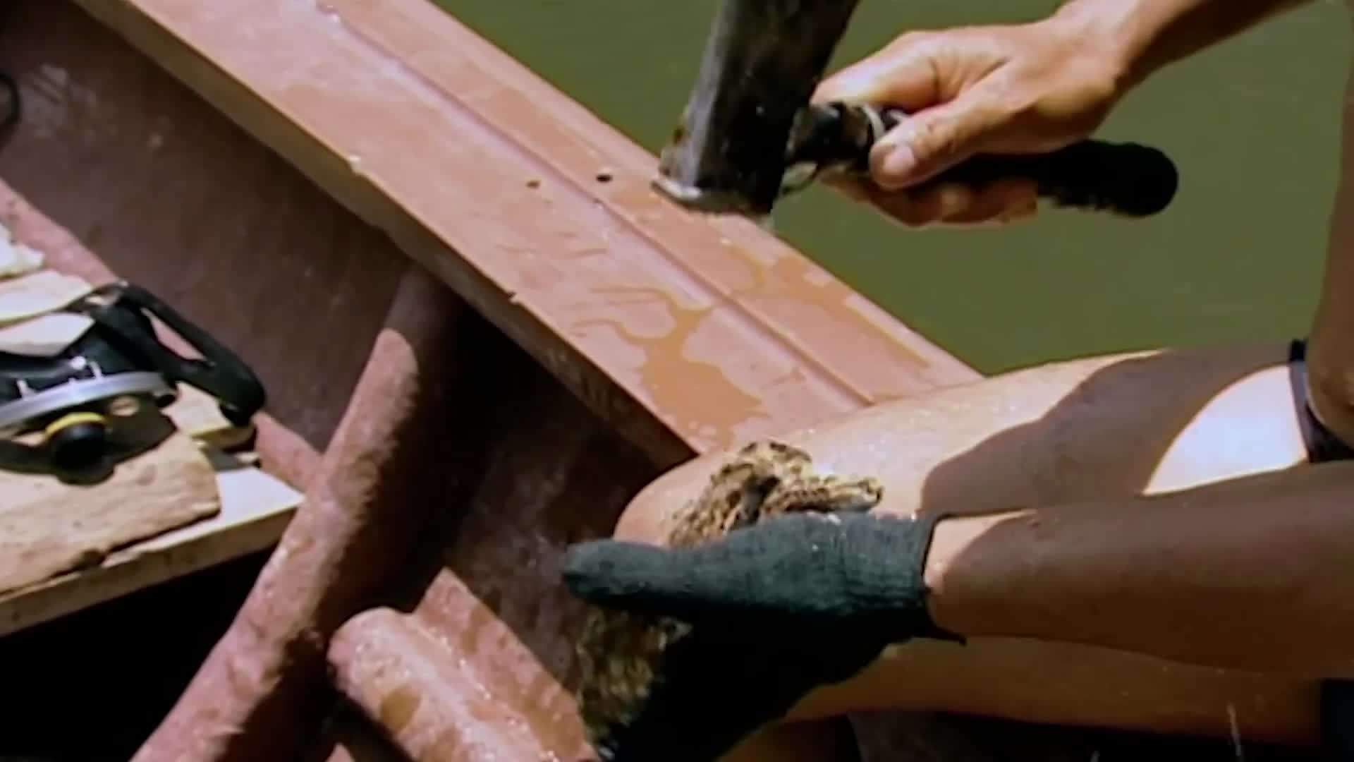 Gordon tasting the freshly caught oyster