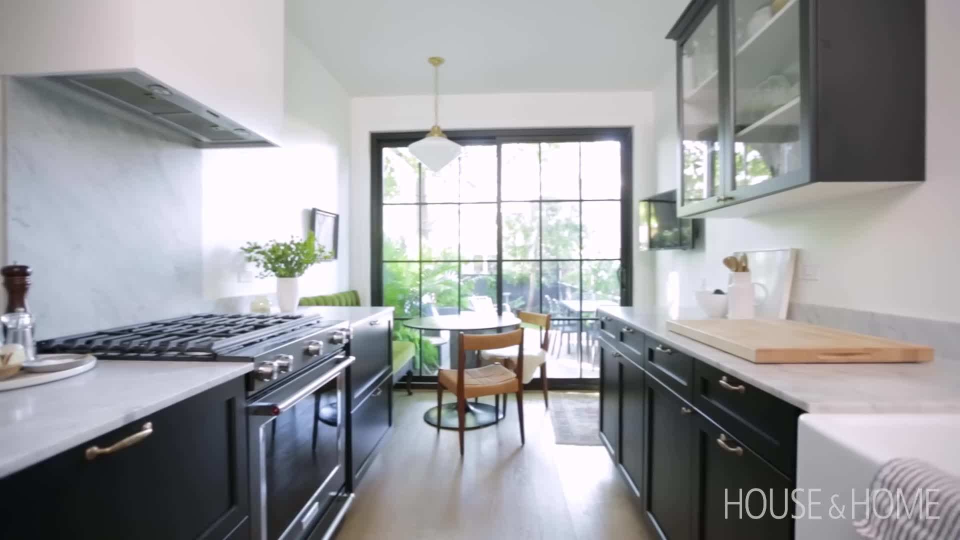 Black Cabinetry and Carrera Marble