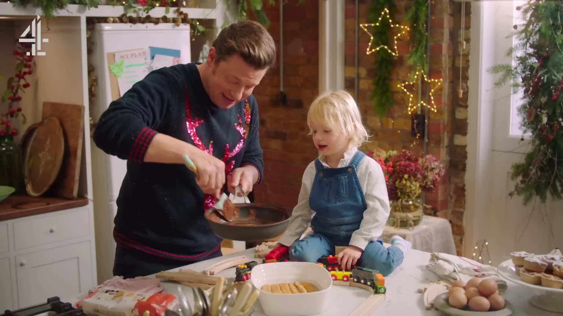 Layering the Chocolate Ganache over Sponge Fingers