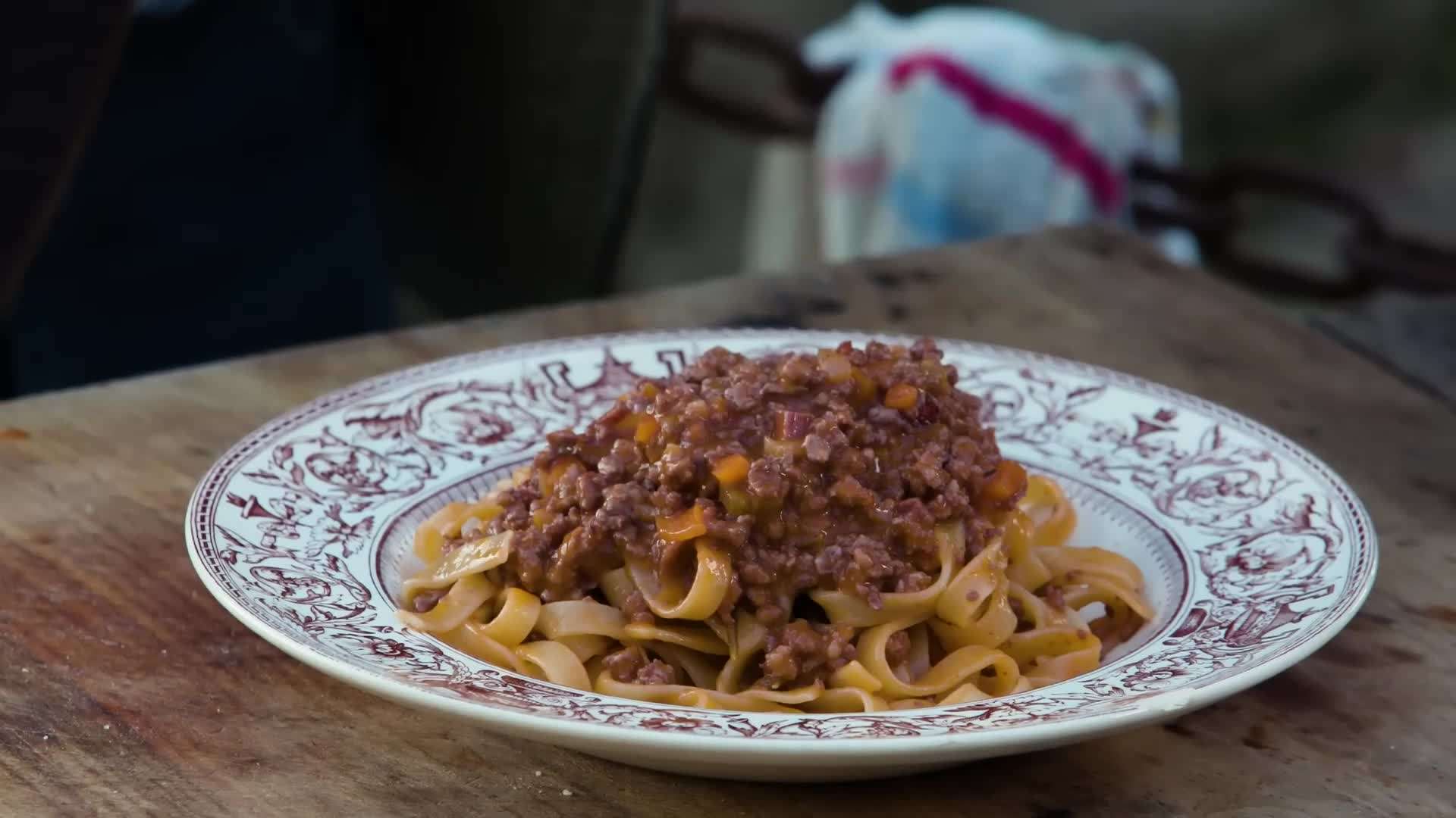 Serving the Bolognese with Pasta