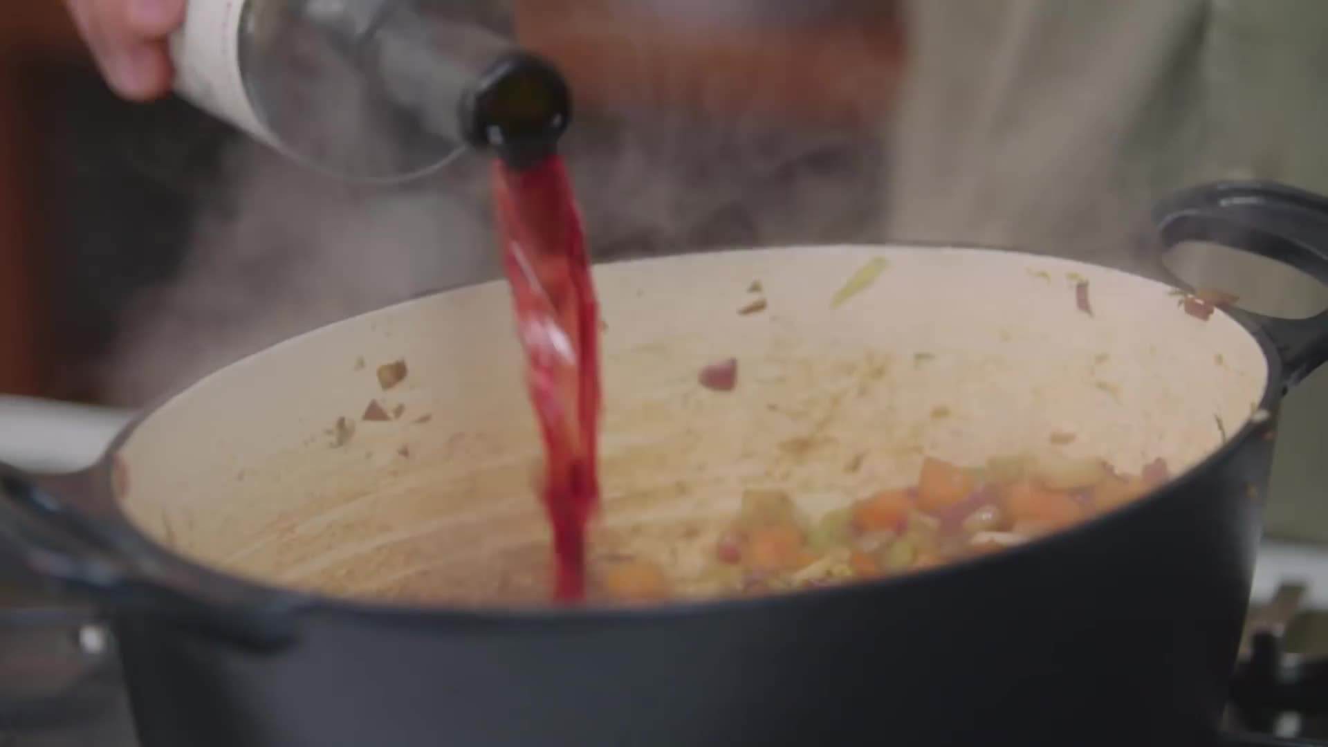 Adding Red Wine and Tomato Puree