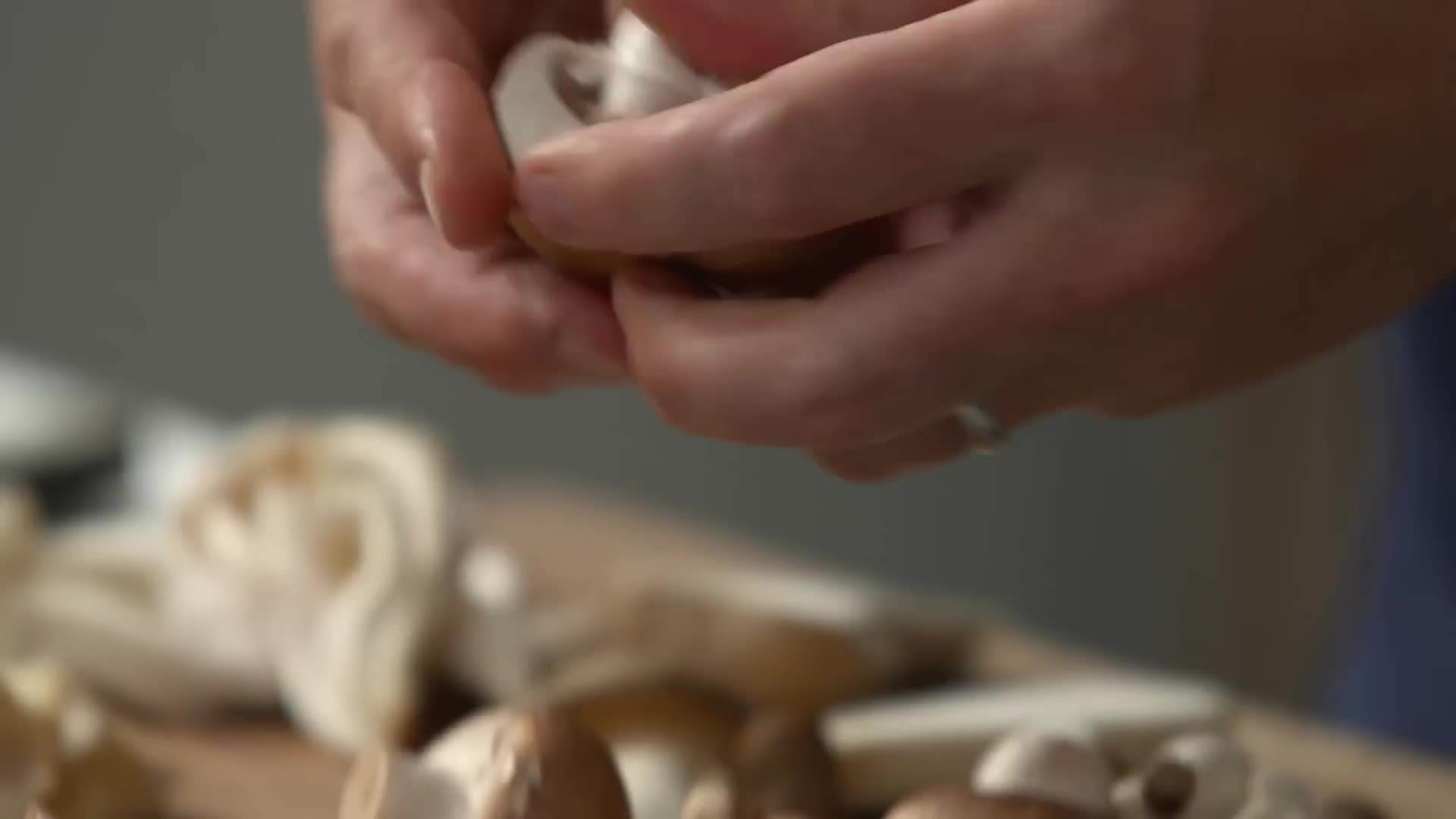 Slicing and preparing a variety of mushrooms for the stroganoff
